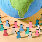 Um conjunto de icones de madeira de diferente cores na frente de um globo terrestre